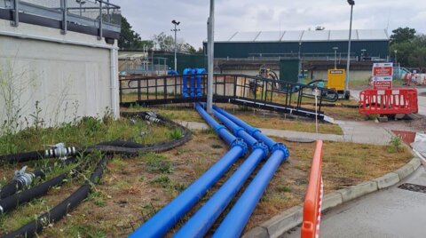 On-site System 2000 installation, showing three parallel pipelines with couplings and flange adaptors as part of an above-ground water network